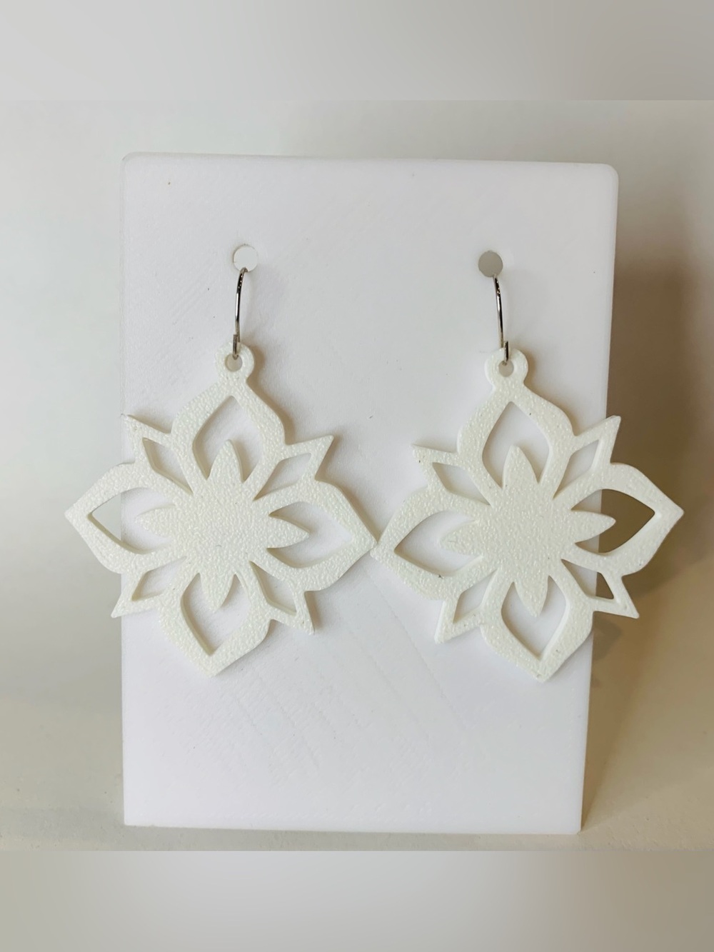 White Floral Cutout Dangle Earrings